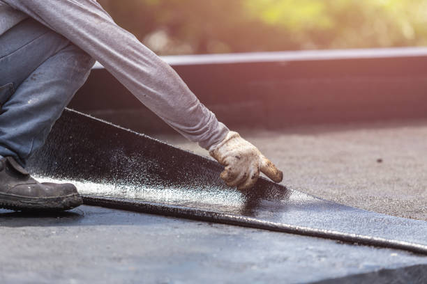 Professional Basement Waterproofing technician working in Sterling, VA